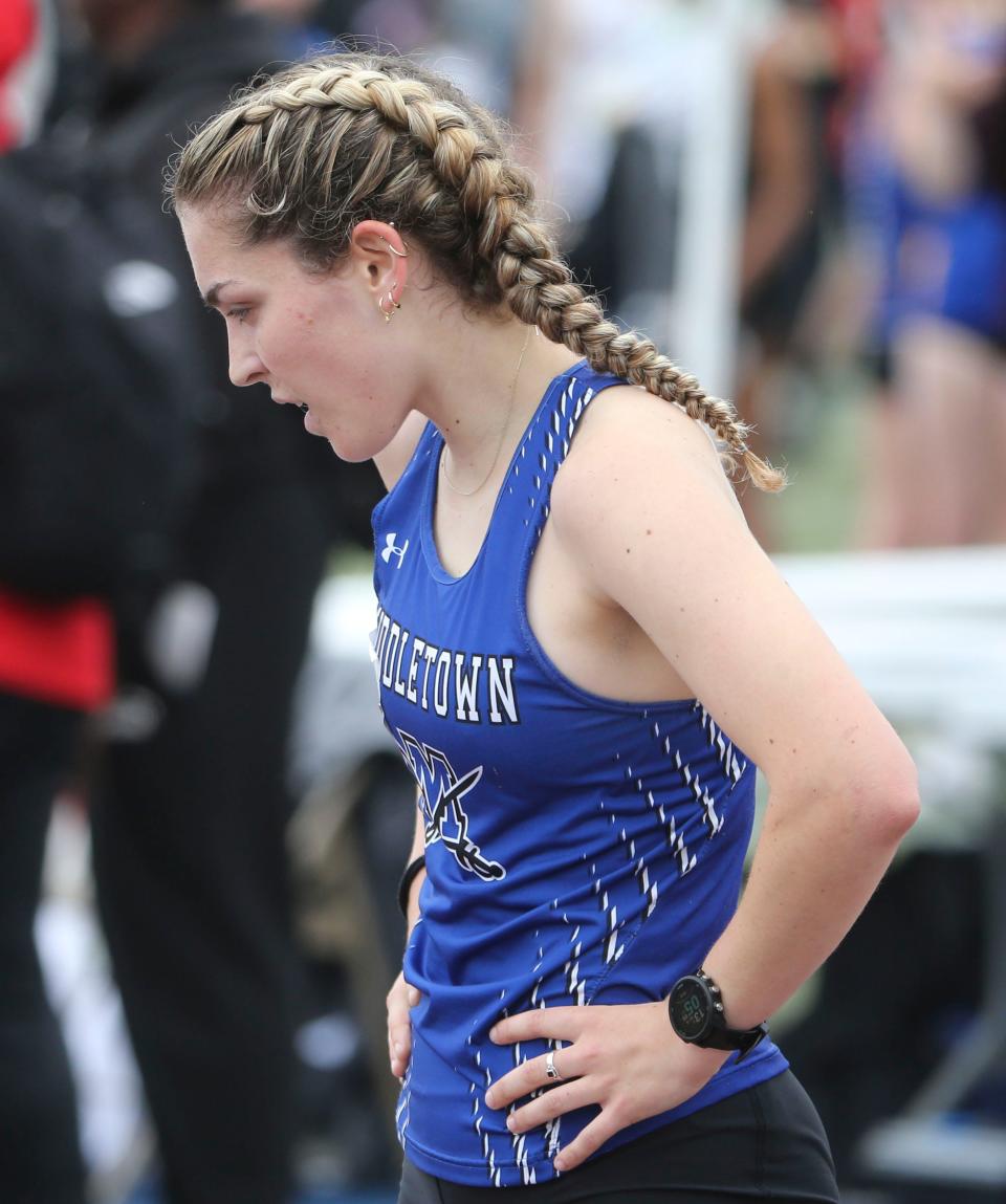 Middletown's Isabelle Walsh recovers after winning the Division I 1600 meter race during the second day of the DIAA state high school track and field championships at Dover High School, Saturday, May 18, 2024.
