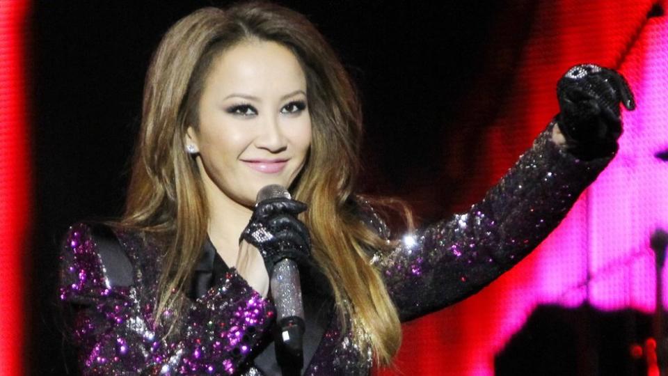 Coco Lee performs on stage during Booey Lehoo Beijing Concert at National Indoor Stadium on December 17, 2011 in Beijing