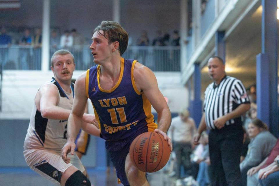 Lyon County’s Travis Perry (11) is the all-time leading scorer in Kentucky high school boys basketball history.