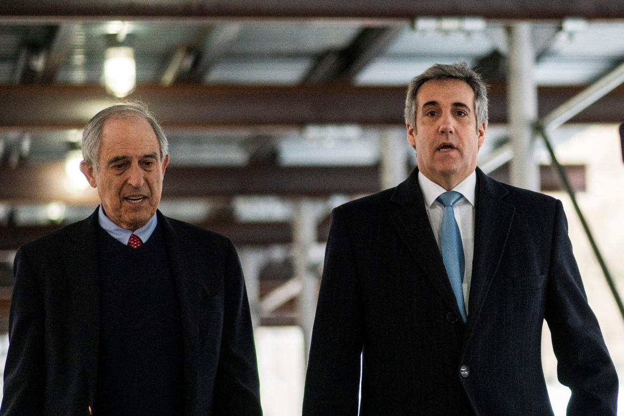 Lanny Davis and Michael Cohen arrive at a courthouse in New York City on March 13.