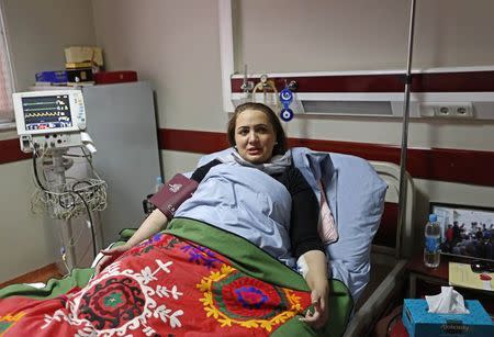 Afghan member of parliament Shukria Barakzai, speaks during an interview at a hospital after having survived an attack on November, in Kabul December 27, 2014. REUTERS/Mohammad Ismail