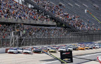 A J Allmendinger, left, leads the field at the start of the NASCAR Xfinity Series auto race at Darlington Raceway, Saturday, May 8, 2021, in Darlington, S.C. (AP Photo/Terry Renna)