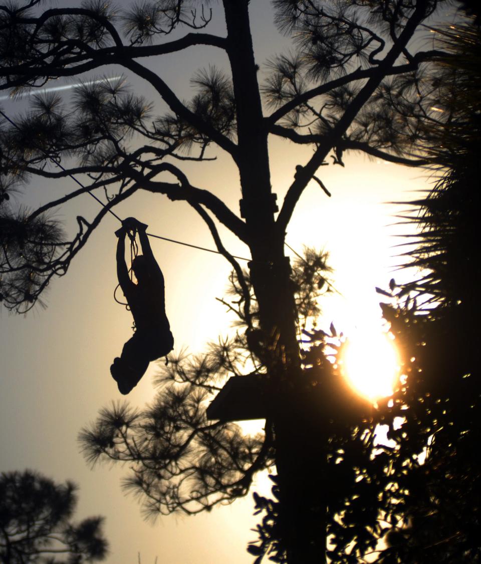 Brevard Zoo's Treetop Trek zipline whisks guests through a self-guided course.