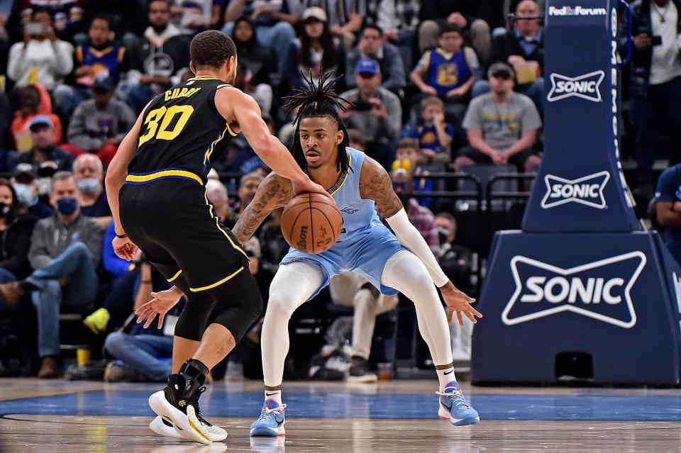 Golden State Warriors superstar Stephen Curry will have to hold off hard-charging Memphis Grizzlies star Ja Morant in the Western Conference semifinals in the 2022 NBA postseason. (Justin Ford/Getty Images)