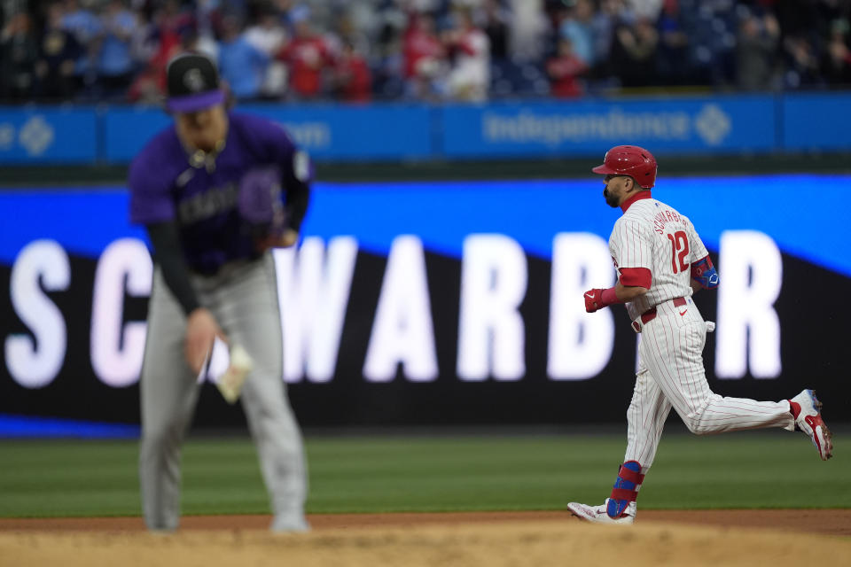 Philadelphia Phillies' Kyle Schwarber runs the basses after hitting a home run off of Colorado Rockies pitcher Ryan Feltner during the first inning of a baseball game, Wednesday, April 17, 2024, in Philadelphia. (AP Photo/Matt Rourke)