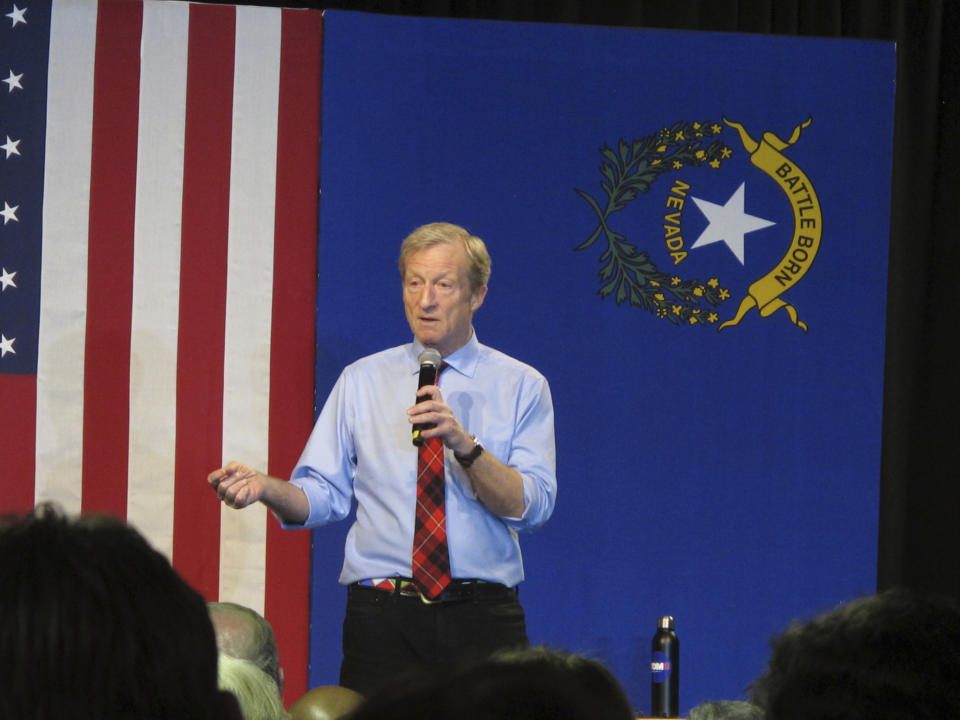 In this Tuesday, Feb. 11, 2020, photo, Democratic presidential hopeful Tom Steyer speaks to about 200 people during a town hall gathering at the National Automobile Museum, in Reno, Nev. The California billionaire says his campaign is "doing fine" despite dismal showings in Iowa and New Hampshire, but has to do "very well" in the Nevada caucuses next up Feb. 22. (AP Photo/Scott Sonner)