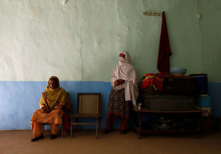 Shehreen (R), aunt of Ambreen Riasat, and another relative are pictured in their home in the village of Makol outside Abbottabad, Pakistan May 6, 2016. REUTERS/Caren Firouz