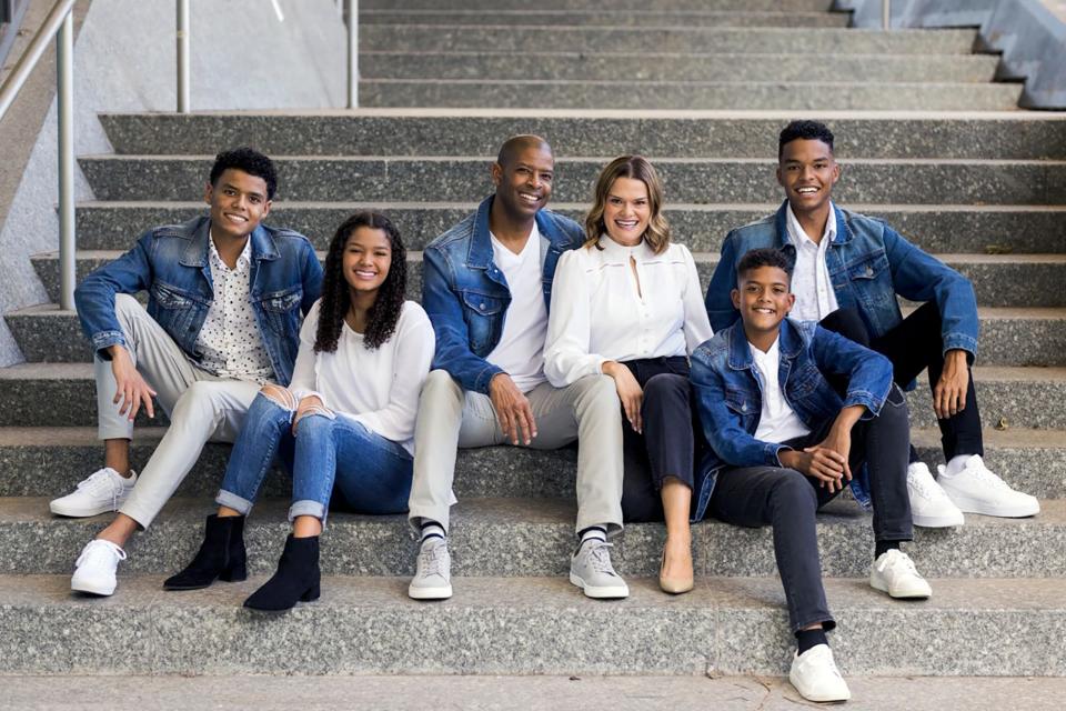 The Rev. Herbert Cooper and his wife Tiffany, center, are shown here with their four children. The couple founded People's Church on Mother's Day 20 years ago. 