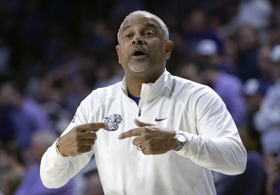 Kansas State coach Jerome Tang instructs his team during the first half of an NCAA college basketball game against Kansas, Monday, Feb. 5, 2024, in Manhattan, Kan. (Travis Heying/The Wichita Eagle via AP)