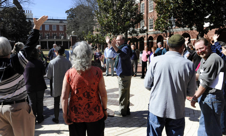 Art Laffin, center, from Washington, D.C., rallies supporters of three anti-nuclear weapons activists before their sentencing hearing Tuesday, Feb. 18, 2014, in Knoxville, Tenn. Michael Walli, Sister Megan Rice and Greg Boertje-Obed were convicted of interfering with national security when they broke into the Y-12 nuclear weapons plant and defaced a uranium storage facility on July 28, 2013. (AP Photo/Knoxville News Sentinel, Michael Patrick)