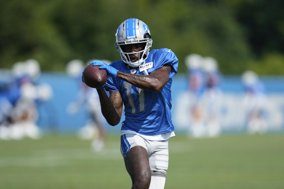 Detroit Lions wide receiver Denzel Mims catches a ball during an NFL football practice in Allen Park, Mich., Wednesday, Aug. 9, 2023. (AP Photo/Paul Sancya)