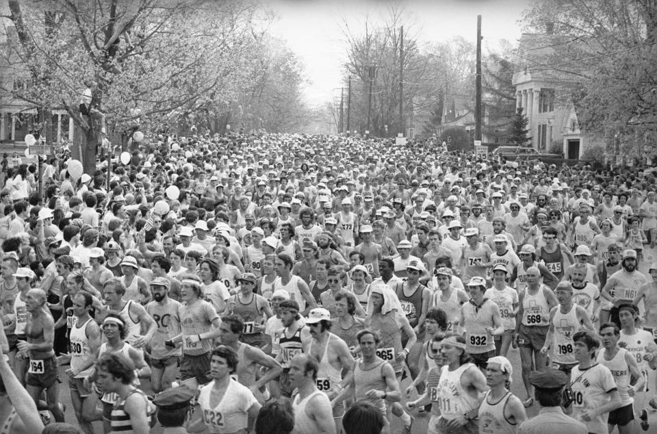 FILE - Runners begin their dash from Hopkinton, Mass., to Boston on April 19, 1976 in the 80th annual Boston Marathon Once a year for the last 100 years, Hopkinton becomes the center of the running world, thanks to a quirk of geography and history that made it the starting line for the world's oldest and most prestigious annual marathon. (AP Photo/File)