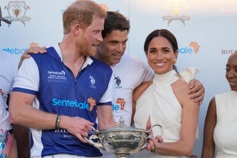 Harry and Markle have been friends with the pro polo player for years. They are pictured together in April. AP