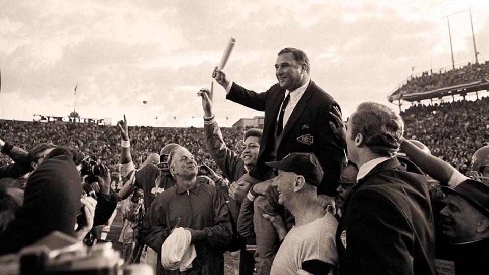 Coach Hank Stram rides on the shoulders of his players in celebration of their victory over the Minnesota Vikings in Super Bowl 4.