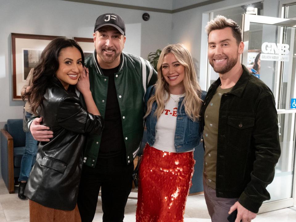 Francia Raisa, Joey Fatone, Hilary Duff, and Lance Bass on the set of season two, episode 17 of "How I Met Your Father."