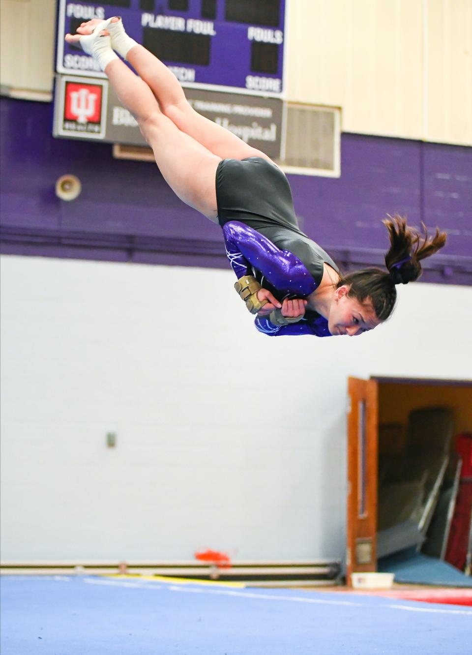 Bloomington South’s Maddie Kawanishi performs her floor routine during the gymnastics meet against Bloomington North and Edgewood at South on Monday, Jan. 8, 2024.