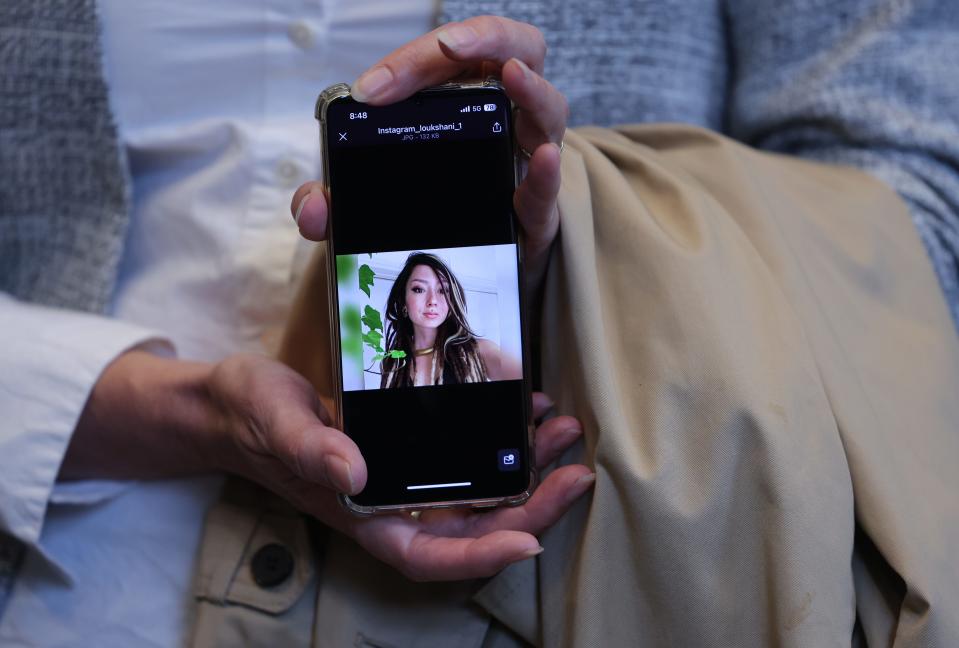 Ricarda Louk displays a photograph of her daughter Shani Louk, 22, who is a hostage of Hamas, prior to a meeting between Bundestag President Baerbel Bas and family members of Hamas hostages who are German citizens on October 19, 2023 in Berlin, Germany.