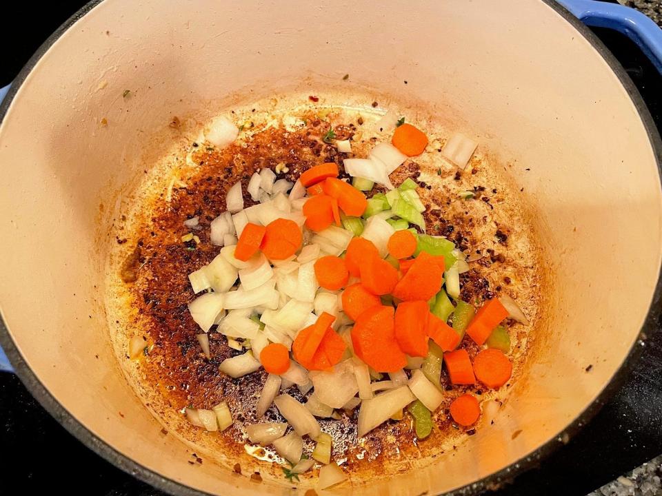 Adding vegetables to Carbone pasta