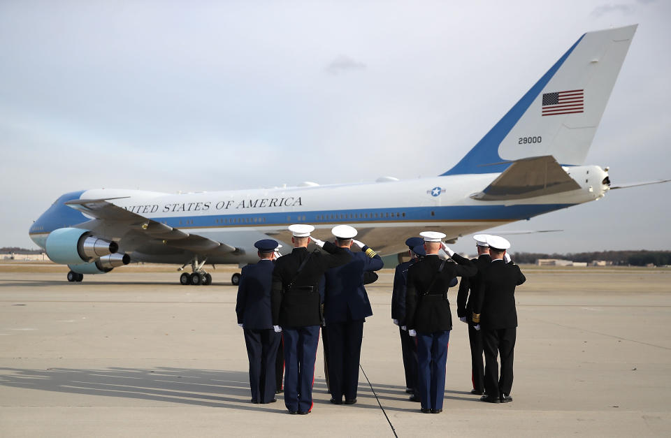 Members of the Joint Chiefs salute as a U.S. Air Force 747, that is being called ‘Special Mission 41’, takes off carrying the casket of former President George H.W. Bush, on Dec. 5, 2018 in Joint Base Andrews, Md. (Photo: Mark Wilson/Getty Images)