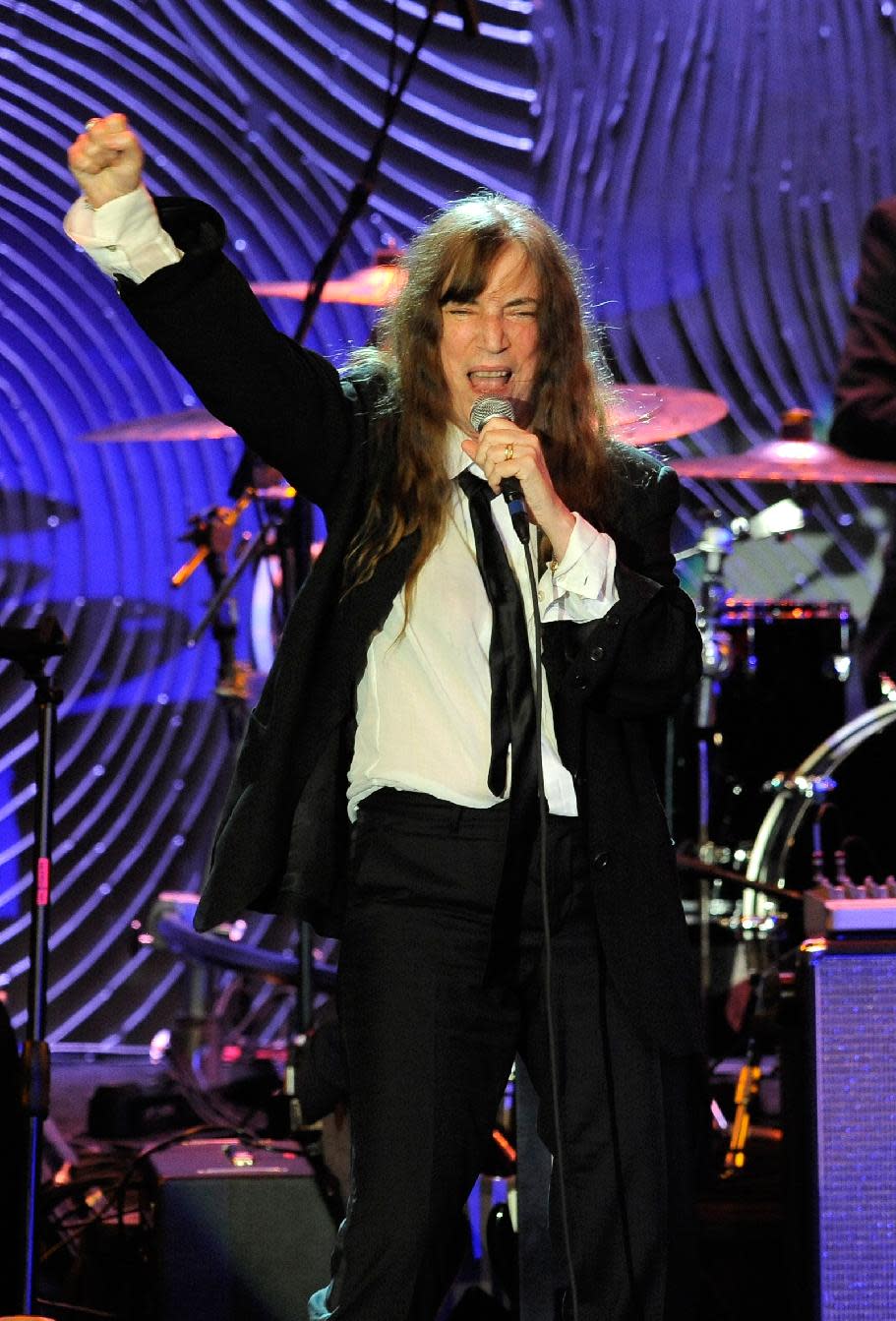 Recording artist Patti Smith performs at the Clive Davis Pre-GRAMMY Gala on Saturday, Feb. 9, 2013 in Beverly Hills, Calif. (Photo by Chris Pizzello/Invision/AP)