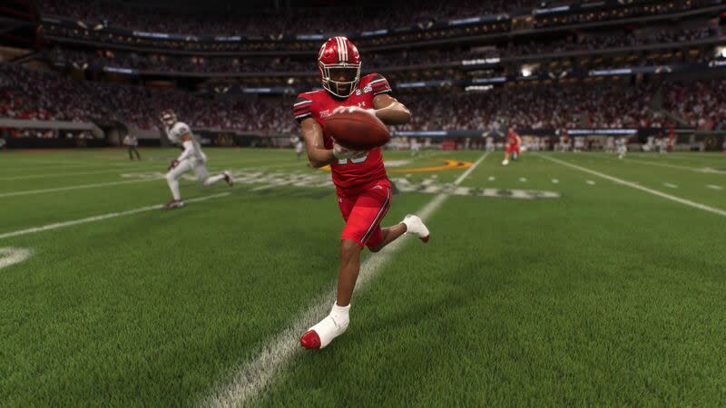 Utah wide receiver Money Parks catches a pass in the new EA Sports College Football 25 video game. | EA Sports College Football 25