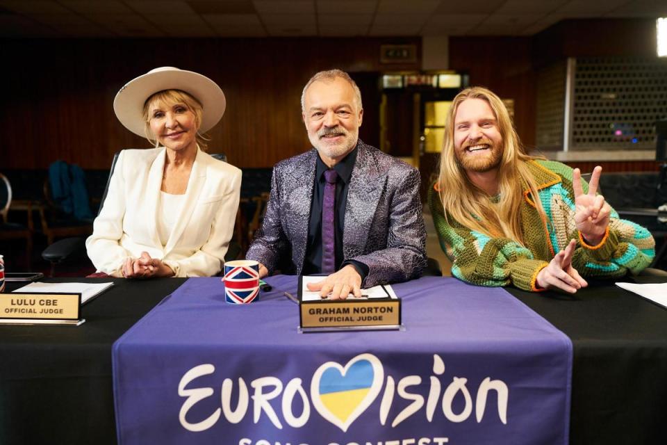 Judges: Lulu, Graham Norton and Sam Ryder in the Comic Relief comedy sketch <i>(Image: PA Wire/ BBC)</i>