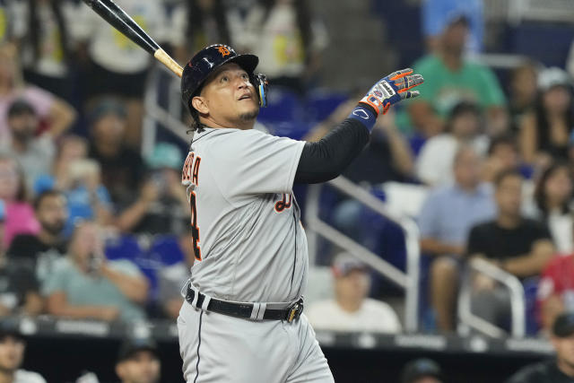 Detroit Tigers designated hitter Miguel Cabrera kisses his son