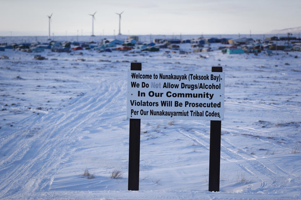 A sign displays rules Saturday, Jan. 18, 2020, in Toksook Bay, Alaska. The first Americans to be counted in the 2020 Census starting Tuesday, Jan. 21, live in this Bering Sea coastal village. The Census traditionally begins earlier in Alaska than the rest of the nation because frozen ground allows easier access for Census workers, and rural Alaska will scatter with the spring thaw to traditional hunting and fishing grounds. (AP Photo/Gregory Bull)