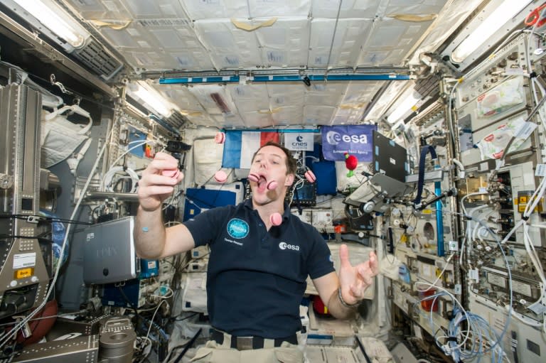 French astronaut Thomas Pesquet displays his juggling and eating skills during a light moment on the International Space Station, in an image released by the European Space Agency (ESA) and NASA on February 27, 2017