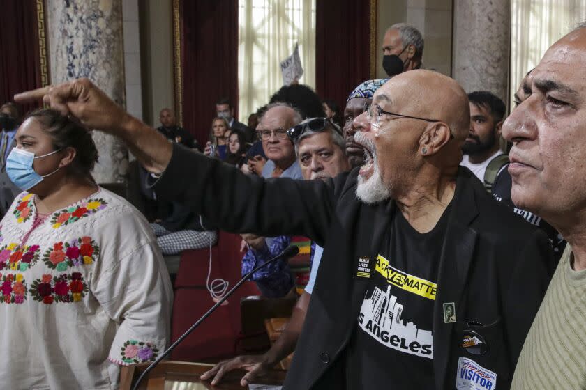 Los Angeles, CA - October 11: Earl Ofari Hutchinson joins public demanding resignations of Los Angeles City Council president, Nury Martinez, council members Gil Cedillo and Kevin de Leon at council meeting on Tuesday, Oct. 11, 2022 in Los Angeles, CA. (Irfan Khan / Los Angeles Times)