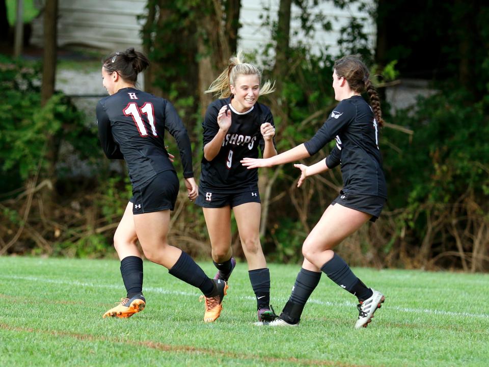 Sydney Maxwell celebrates with a teammate after scoring a goal during Rosecrans' 5-1 loss to visiting Worthington Christian on Wednesday at Mattingly Family Field.