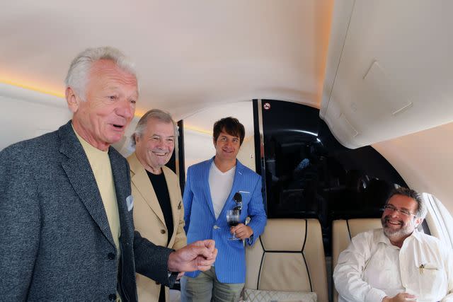 <p>Food & Wine Archives</p> Jean-Claude Szurdak, Jacques Pépin, Mark Oldman, and Drew Nieporent aboard the Bombardier private jet