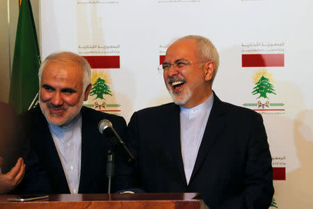 Iran's Foreign Minister Mohammad Javad Zarif (R) reacts during a joint news conference with Lebanese Foreign Minister Gebran Bassil (not pictured) in Beirut, Lebanon November 7, 2016. REUTERS/Aziz Taher