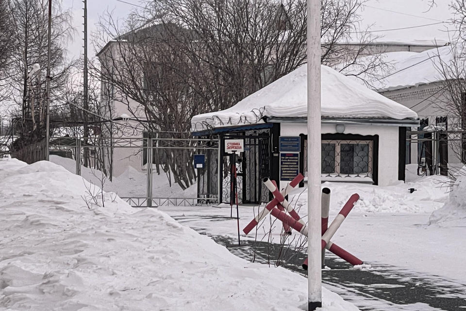 A view of the entrance of the prison colony in the town of Kharp, in the Yamalo-Nenetsk region about 1,900 kilometers (1,200 miles) northeast of Moscow, Russia, on Sunday, Feb. 18, 2024. Alexei Navalny, the fiercest foe of Russian President Vladimir Putin who crusaded against official corruption and staged massive anti-Kremlin protests, died in prison Friday Feb. 16, 2024 Russia's prison agency said. He was 47. (AP Photo)