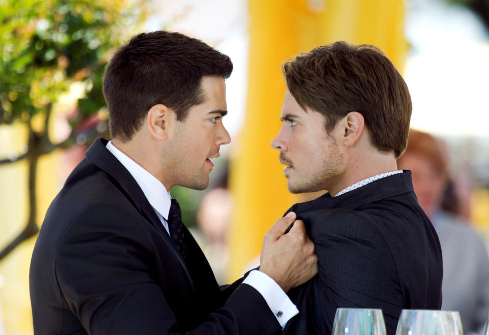 This publicity image released by TNT shows Jesse Metcalfe as Christopher Ewing, left, and Josh Henderson as John Ross Ewing in a scene from "Dallas," premiering Wednesday June 13, at 9:00 p.m. on TNT. (AP Photo/TNT, Erik Heinila)
