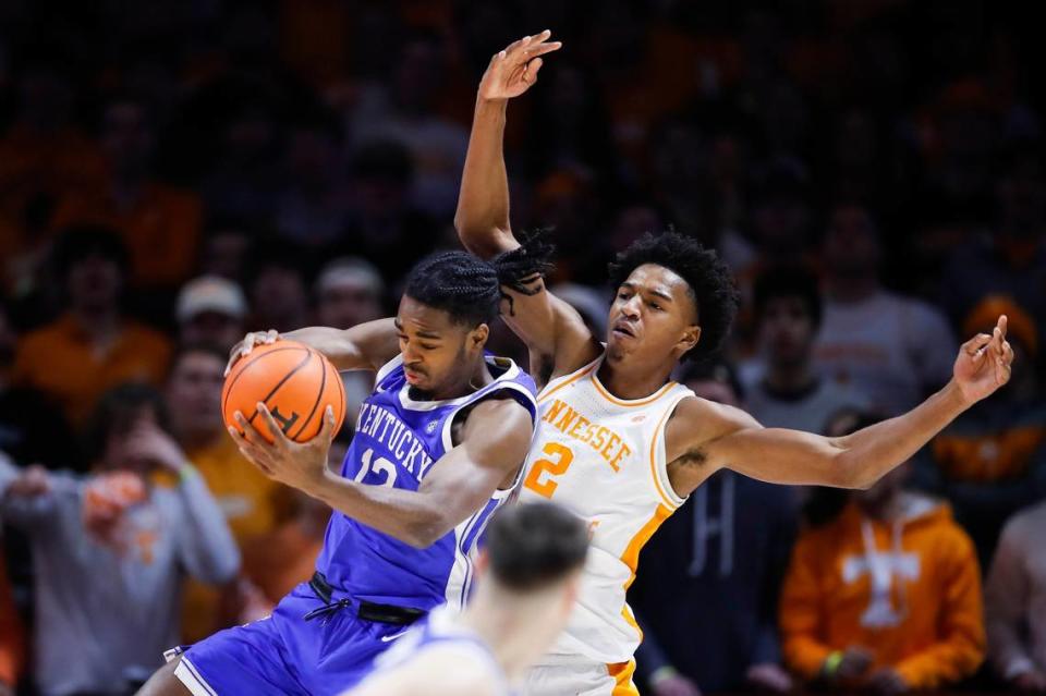 Kentucky Wildcats guard Antonio Reeves (12) grabs a rebound from Tennessee Volunteers forward Julian Phillips (2) during the game at Thompson-Boling Arena in Knoxville, Tn., Saturday, January 14, 2023.