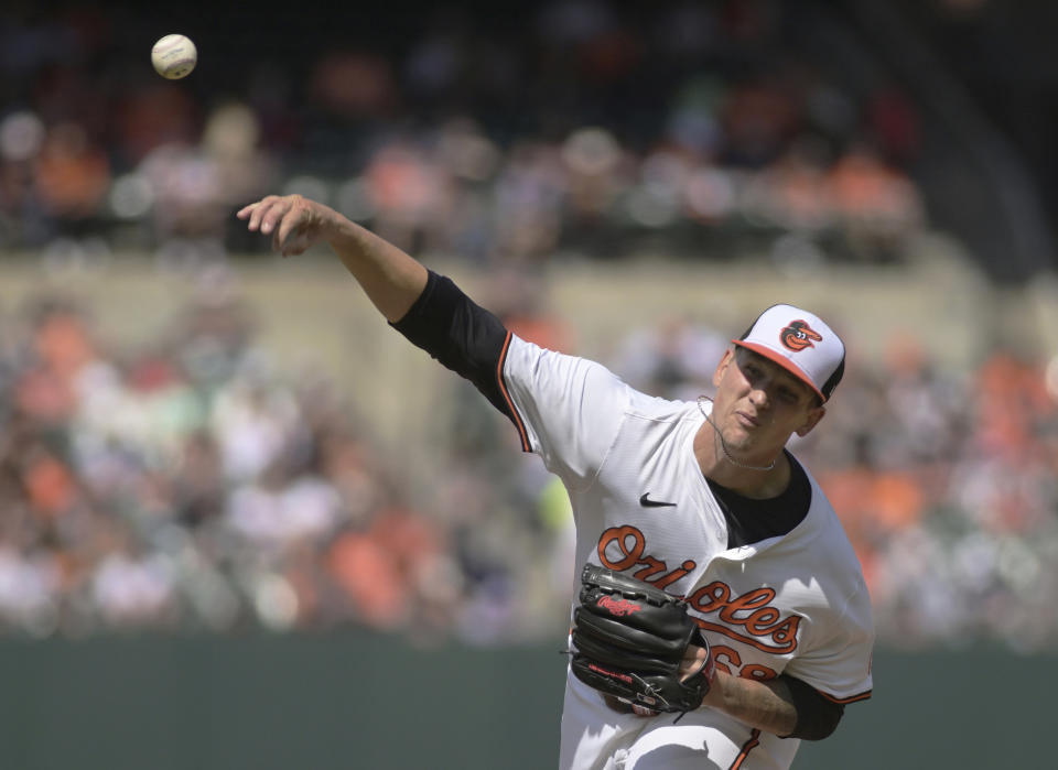 Baltimore Orioles starting pitcher Tyler Wells delivers to a Los Angeles Angels batter during the fourth inning of a baseball game Sunday, March 31, 2024, in Baltimore. (AP Photo/Steve Ruark)