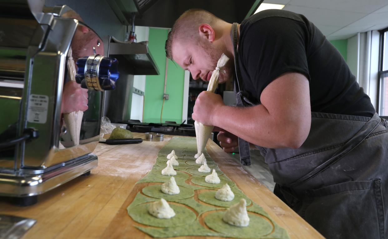 Michael Oldfield makes homemade cappelletti at his M.O. Pasta in the Hungerford Building in Rochester Friday, May 6, 2022.