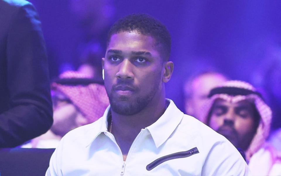 Joshua, who was beaten by Usyk for the first time in 2021, watched ringside (Getty Images)
