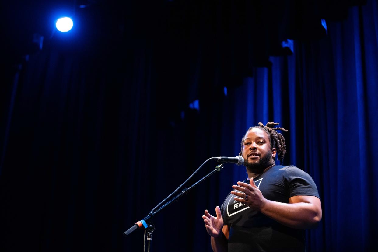 Jordan Brooks tells a story of community during the Des Moines Register Storytellers Project Tuesday, Feb. 27, 2024, at Hoyt Sherman Place in Des Moines.