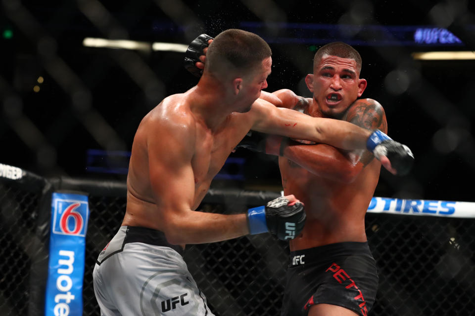 ANAHEIM, CALIFORNIA - AUGUST 17: Anthony Pettis throws a punch in the second round against Nate Diaz during their Welterweight Bout at UFC 241 at Honda Center on August 17, 2019 in Anaheim, California. (Photo by Joe Scarnici/Getty Images)