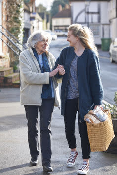 <span class="caption">Helping hand.</span> <span class="attribution"><a class="link " href="https://www.shutterstock.com/image-photo/teenage-girl-helping-senior-woman-carry-344337719?src=qCGDX0nEc_3KkDG4XjagAw-1-0" rel="nofollow noopener" target="_blank" data-ylk="slk:SpeedKingz/Shutterstock;elm:context_link;itc:0;sec:content-canvas">SpeedKingz/Shutterstock</a></span>