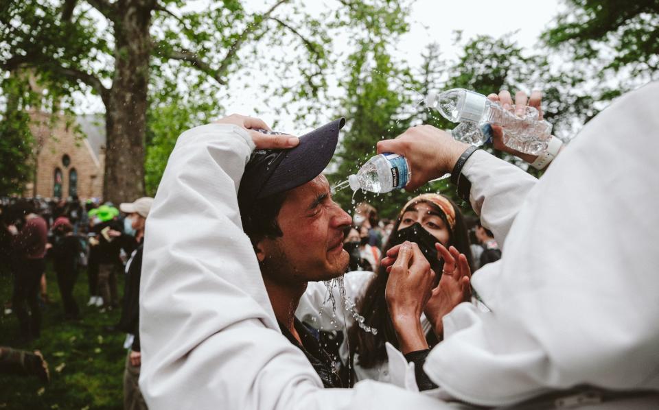 A protestor is pepper sprayed at the University of Virginia protest