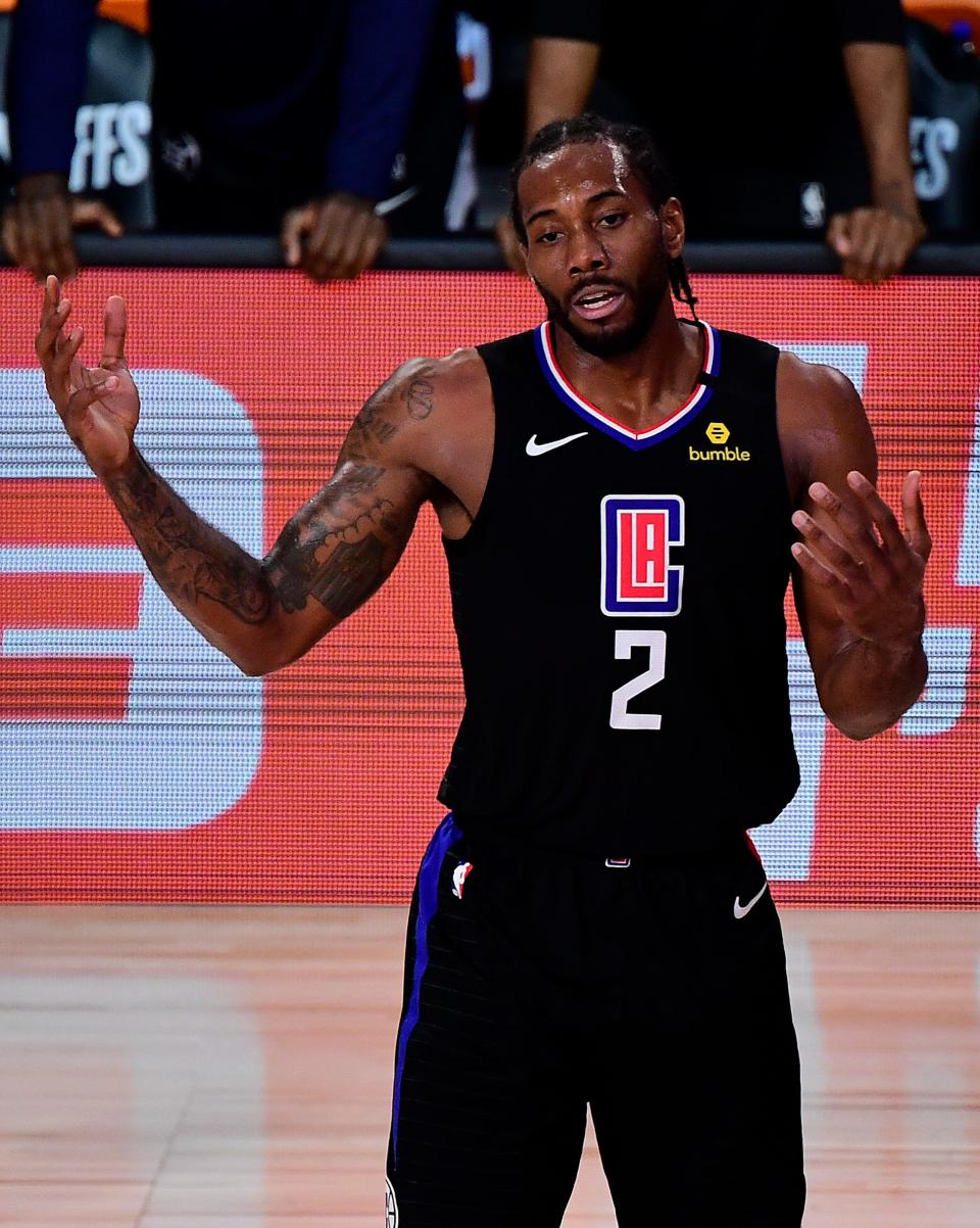 Kawhi Leonard of the LA Clippers of the LA Clippers reacts during the third quarter against the Denver Nuggets in Game Seven of the Western Conference Second Round.