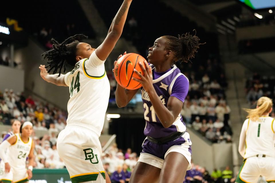 Kansas State center Eliza Maupin (21) looks to score against Baylor's Dre'Una Edwards (44) during their game Monday night at Foster Pavilion in Waco, Texas. Maupin had 16 points and nine rebounds for the Wildcats in a 58-55 victory.