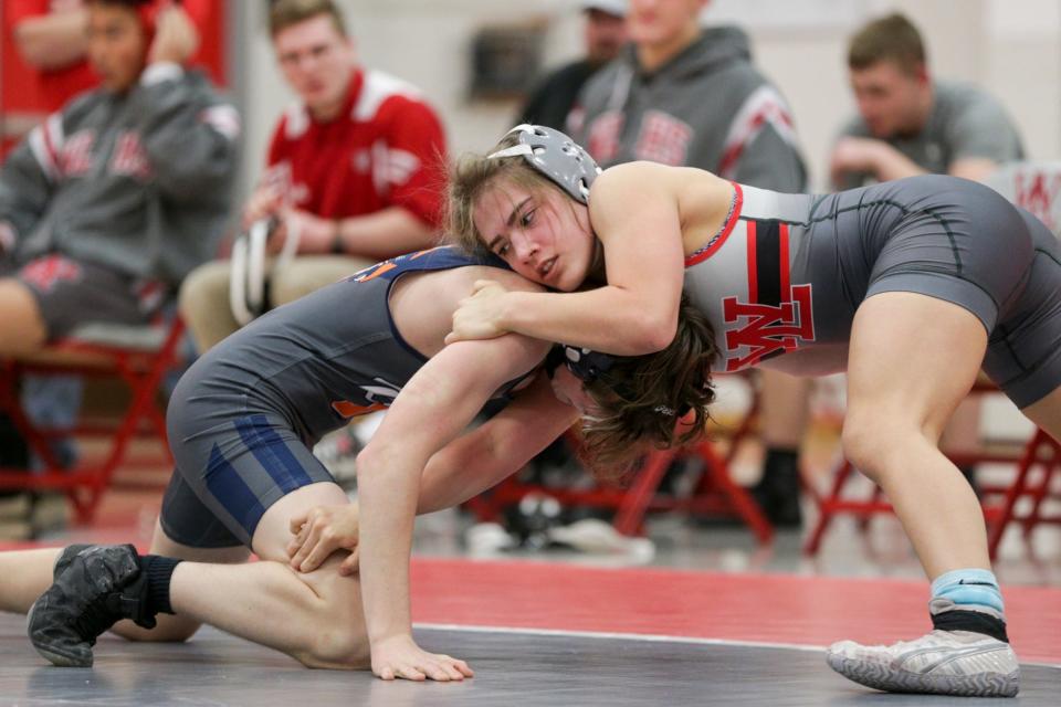 West Lafayette's Rose Kaplan, right, wrestles Harrison's Mitchell Kinsey during a 120 pound bout in an IHSAA wrestling meet, Friday, Jan. 21, 2022 in West Lafayette.