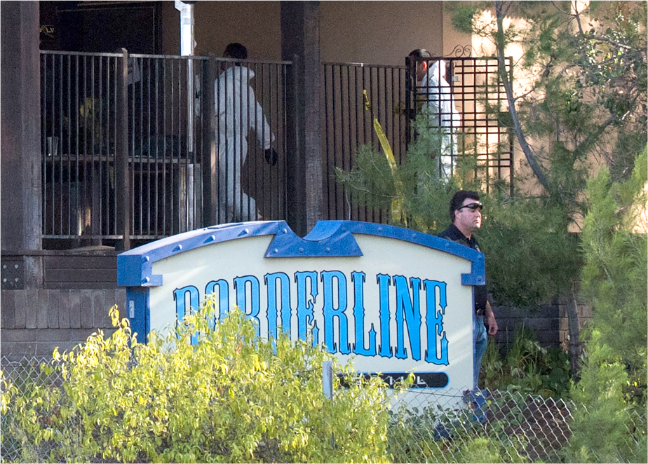 investigators work the scene at borderline