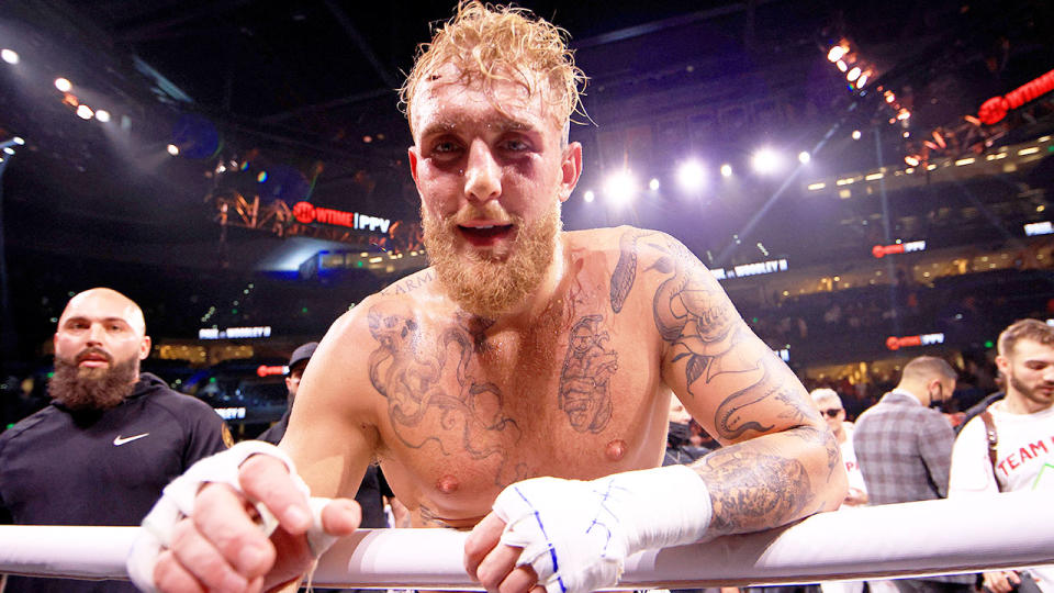 Pictured here, Jake Paul speaks into a camera after beating Tyron Woodley.