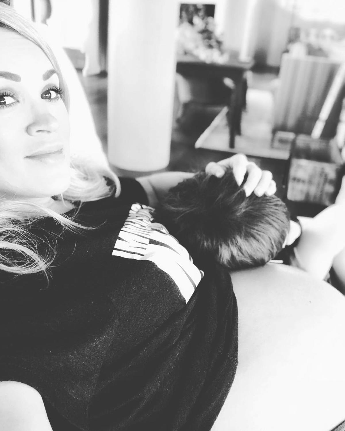 Carrie Underwood Sports Baby Bump During Family Disneyland Trip