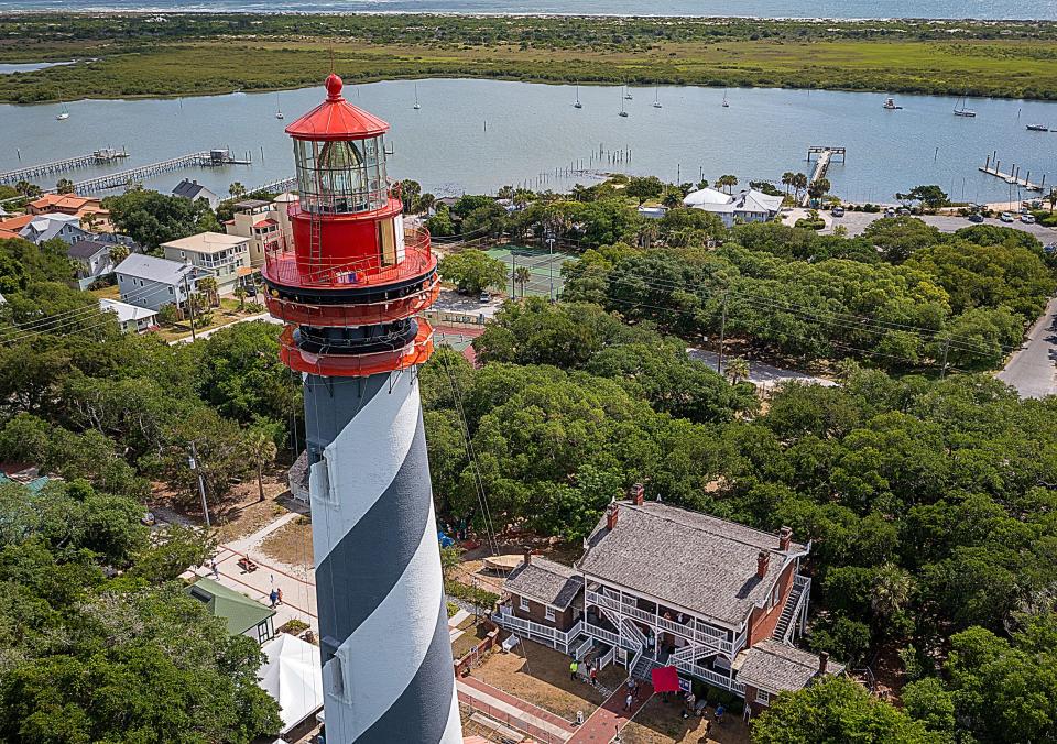 Tarps surround the top of the St. Augustine Lighthouse as part of a painting and restoration project ongoing at the historic structure on Anastasia Island in the city on Monday, May 9, 2022. 
The project, which includes painting the interior and exterior of the tower and work on the building's metal stairs and railings, is scheduled to be finished in about two weeks. 
"We paint the outside of the lighthouse every five to six years," said Kathy Fleming, executive director of the lighthouse. "But this is the first time in about 30 years that we have painted the inside."